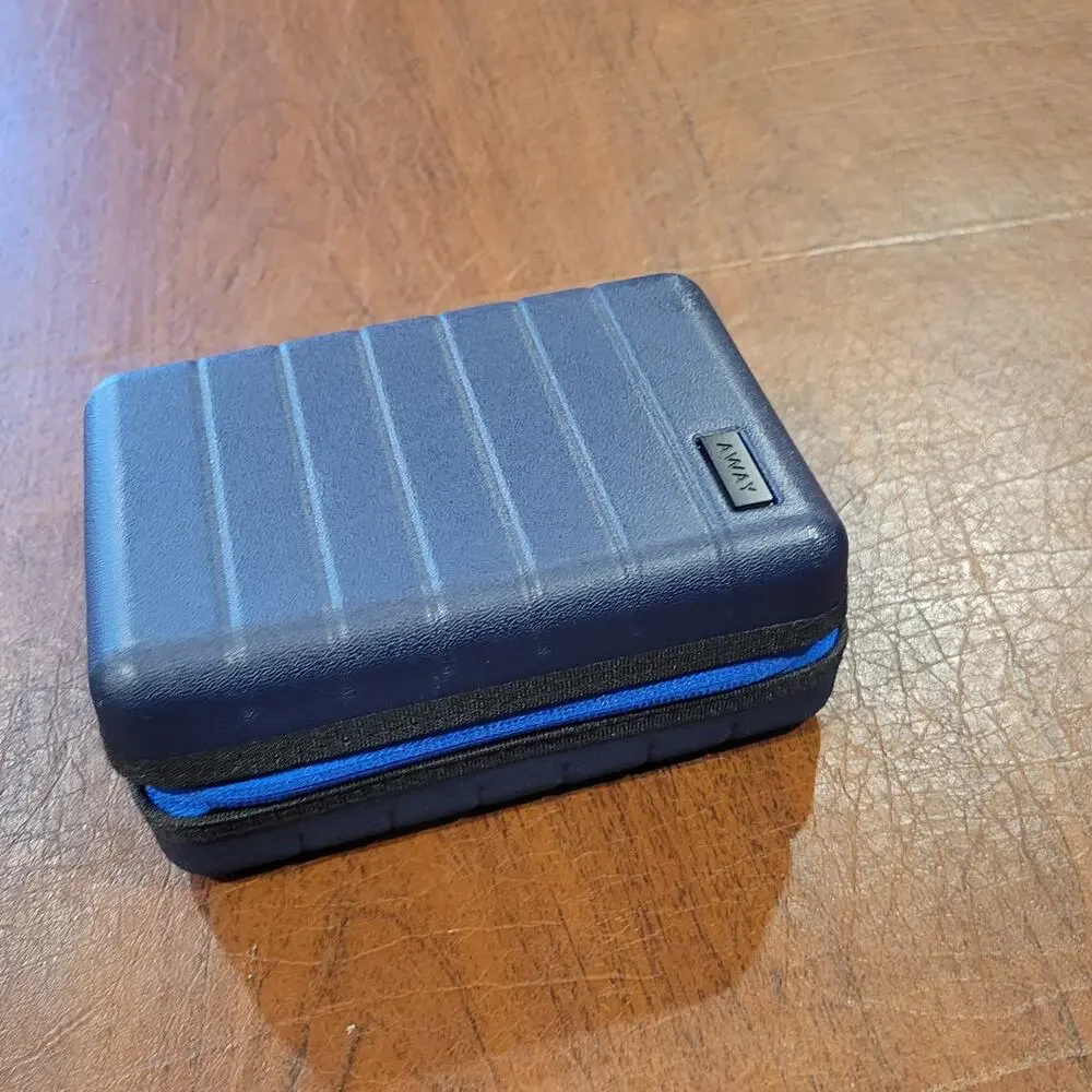New AWAY Travel The Mini Suitcase Toiletry Case United Polaris Amenity Kit Pouch
